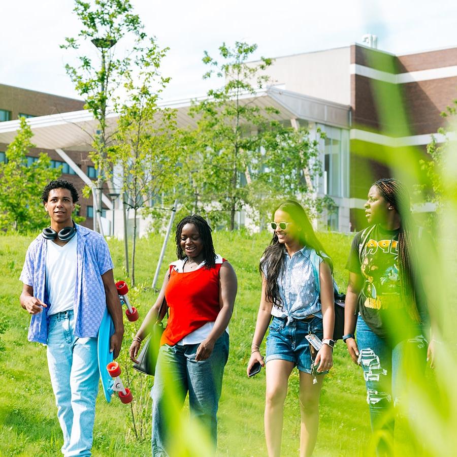 students on a quad walk